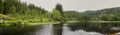 dark water lagoon in a green forest, landscape near the city of Bergen, Norway