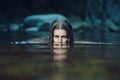 Dark water nymph with intense gaze Royalty Free Stock Photo