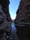 Dark waters of Simpsons Gap in the the MacDonnell Ranges near Alice Springs Royalty Free Stock Photo