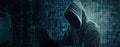 Dark web hacker silhouette in black hoodie holding laptop near computer monitor displaying grid of numbers