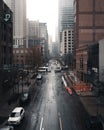 Wet city street on a foggy day Royalty Free Stock Photo
