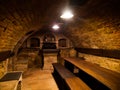 Dark wine cellar with tables