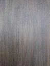 Dark wood background with long straight fiber texture. Brown nat Royalty Free Stock Photo