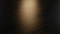 Dark wood grain texture with a dramatic spotlight creating a warm glow Royalty Free Stock Photo