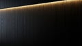 Dark wood paneling with subtle warm LED lighting accentuating grain Royalty Free Stock Photo