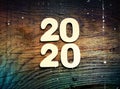 2020. Dark wood texture 2020.New year background. Retro wooden table. Royalty Free Stock Photo