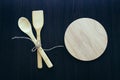 Wooden objects against a dark background. Kitchen and home