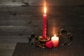 Romantic red candles and heart. Royalty Free Stock Photo
