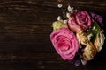 Dark wooden background with withered flowers Royalty Free Stock Photo