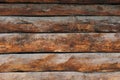 Dark wooden fence. Shabby table, dirty pine lumber. Old wood boards Royalty Free Stock Photo