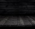 Dark wooden table for product, old black wooden perspective interior Royalty Free Stock Photo