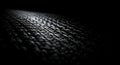 Dark woven texture illuminated by dramatic light Royalty Free Stock Photo