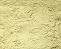 the dark yellow wall texture covered with decorative plaster architecture abstract Royalty Free Stock Photo