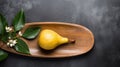 Dark Yellow Wooden Plate With Leaf And Ripe Pear