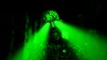 Dark zombie with green rays from the eyes in dungeon. Green color. Royalty Free Stock Photo