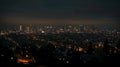 A darkened city skyline with only a few tered lights still shining in some buildings highlighting the widespread power Royalty Free Stock Photo