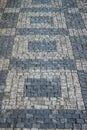 Darker and brighter cobble stones placed in geometric pattern in Prague old town Royalty Free Stock Photo