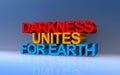 darkness unites for earth on blue Royalty Free Stock Photo