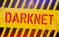 Darknet on warning sign. Grungy style. Cyber crime concept. Dark side of internet.