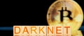 darknet. wooden blocks with the inscription darknet on bitcoin background.