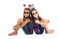 Darling USA patriotic girls sitting missing front teeth smiling