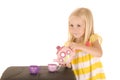 Darling young blond girl playing with a tea in striped shirt Royalty Free Stock Photo