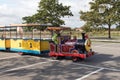 Fun small road train ready for tourist rides with old train Royalty Free Stock Photo