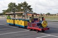 Fun small road train ready for tourist rides with old train Royalty Free Stock Photo