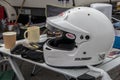 White motorsport helmet on table