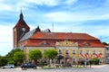 Darlowo, Poland - Historic quarter and market square with medieval St. Mary\'s Church, city hall and Fountain - Fisherman Memorial