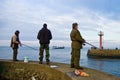 Darlowo Poland: fishing at the port entrance Royalty Free Stock Photo