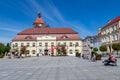 Darlowo, zachodniopomorskie / Poland - June, 4, 2020: Market square and old tenement houses in a small town in Pomerania. The Royalty Free Stock Photo