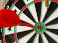 Dart arrow hit target at bullseye Royalty Free Stock Photo