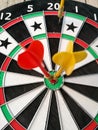 Dart arrow hit target at bullseye Royalty Free Stock Photo