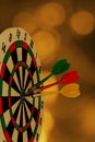 Dart arrow hitting in bullseye on dartboard Royalty Free Stock Photo