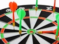 Dart arrow hitting in the target center of dartboard. Success hitting target aim goal achievement concept background.Darts and dar Royalty Free Stock Photo