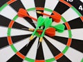 Dart arrow hitting in the target center of dartboard. Success hitting target aim goal achievement concept background.Darts and dar Royalty Free Stock Photo