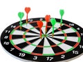 Dart arrow hitting in the target center of dartboard. Success hitting target aim goal achievement concept background.Darts and dar Royalty Free Stock Photo