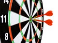 Dart arrow hitting in the target center of dartboard. Success hitting target aim goal achievement concept background.Darts and dar Royalty Free Stock Photo