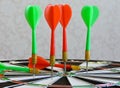 Dart arrow hitting in the target center of dartboard. Success hitting target aim goal achievement concept background.Darts and dar Royalty Free Stock Photo