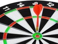 Dart arrow hitting in the target center of dartboard. Success hitting target aim goal achievement concept background.Darts and dar Royalty Free Stock Photo