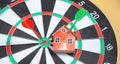 Dart arrow, house model on dartboard Royalty Free Stock Photo