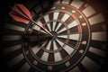 Dart board and arrow in middle. Business and success concept. Achievement and target theme. Orange sun light effect. High contrast Royalty Free Stock Photo