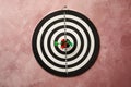 Dart board with arrows hitting target Royalty Free Stock Photo
