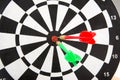 Dart board with darts, selective focus on board Royalty Free Stock Photo