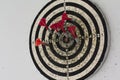 Dart board with hanging on the wall Royalty Free Stock Photo