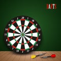 Dart boards with colored steel darts on green background