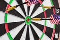 dart in bullseye on the target with many other Darts
