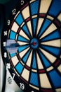 Dart hitting the center bull`s eye Royalty Free Stock Photo