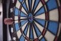 Dart hitting the center bull`s eye Royalty Free Stock Photo